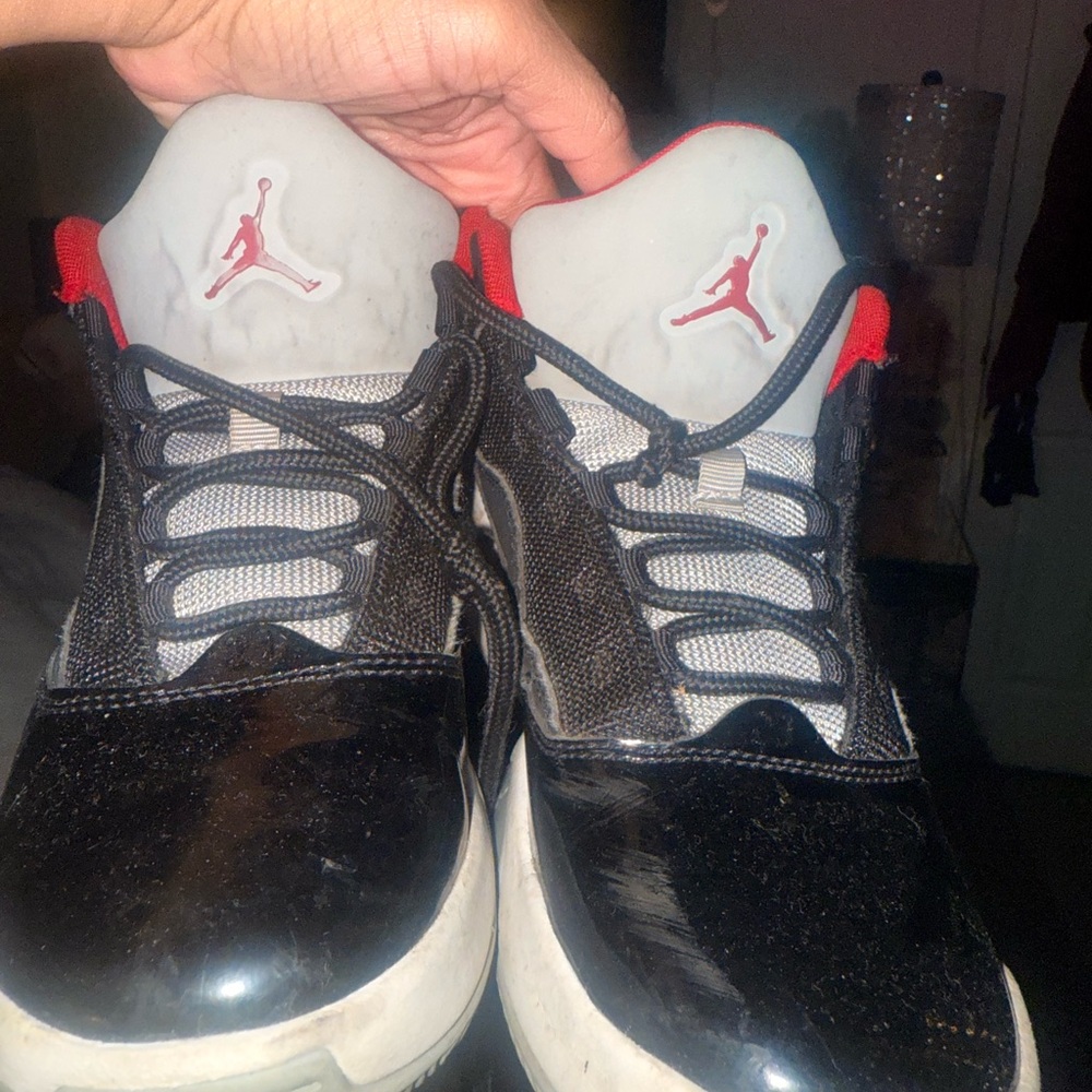 Jordan Kids Black and White Sneakers with Red Accents